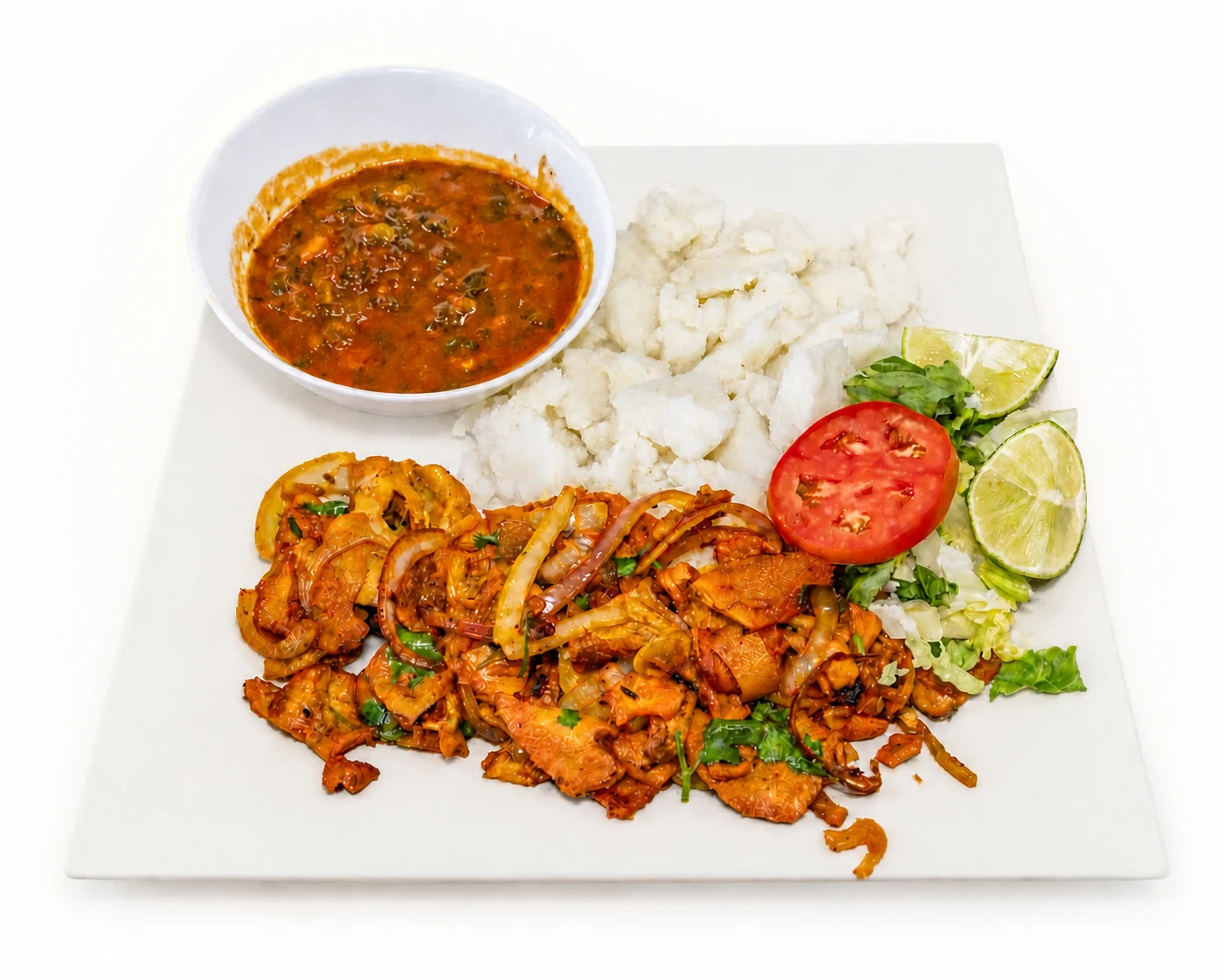 Chicken served with traditional sides and stew